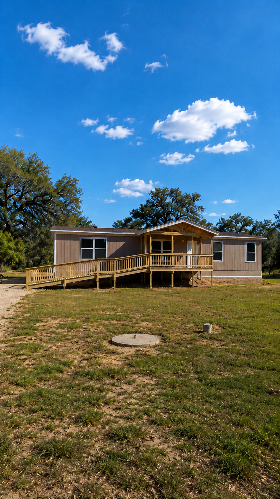 After — finished home with porch and ramp installed by Texas Elite